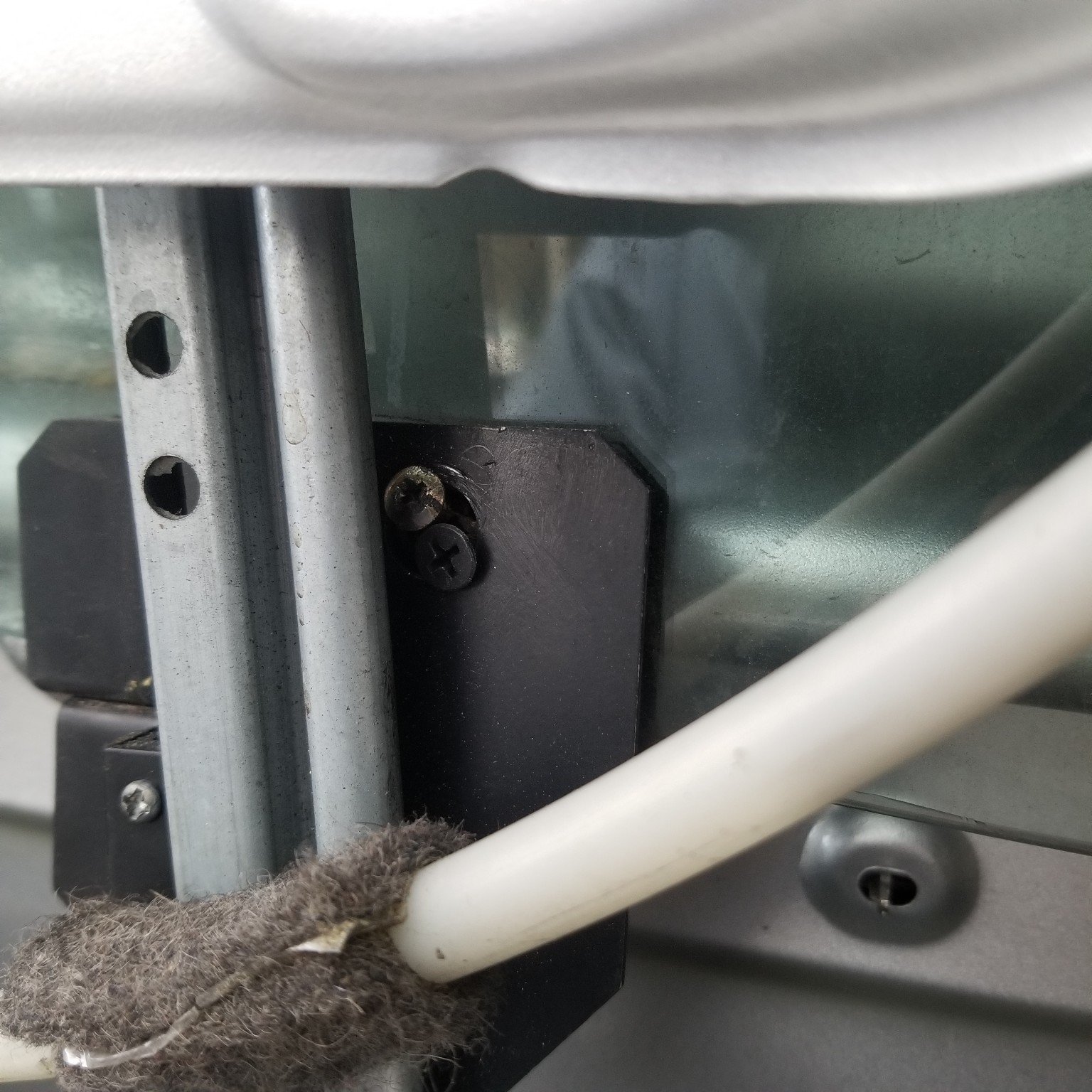 Vehicle door glass and window track repair